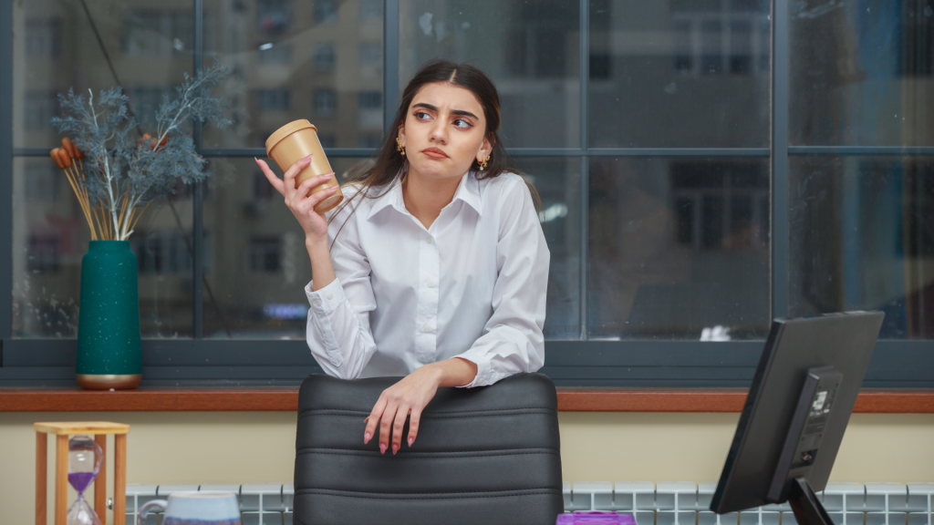 Women thinking with a cup of coffee as to what's next for QSR?